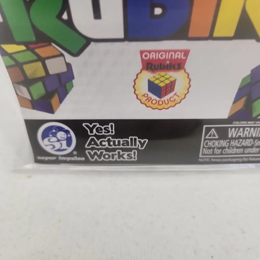 Game World's Smallest RUBIKS Cube Puzzle 3/4